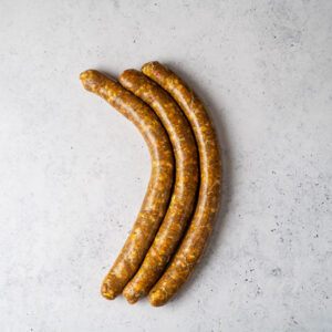 Chipolata con Curry